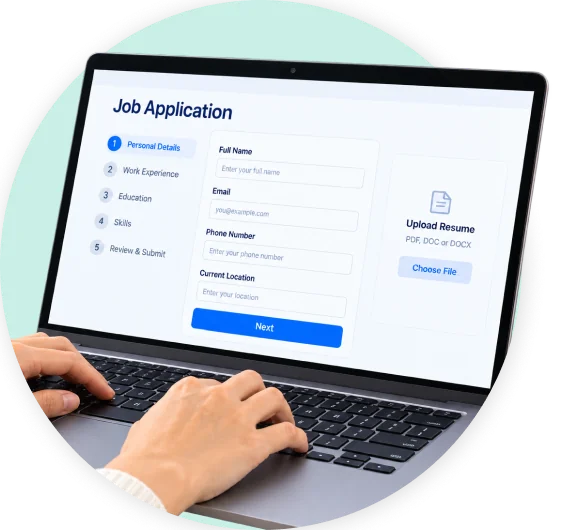 A candidate filling in an online job application on a laptop